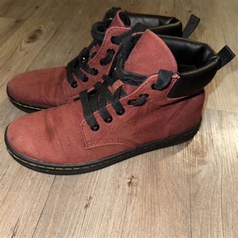 Martens boots feature red laces, a symbol adopted by the white supremacist movement. . Red laces on doc martens
